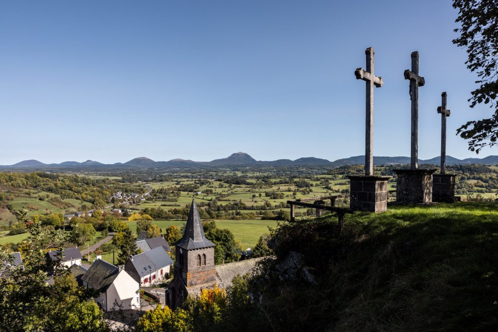 View of the village of st pierre roche and the chain of puys